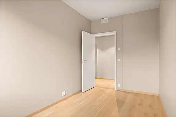 Soverom 3; rommene er for det meste holdt i en lun og tidsriktig beigetone