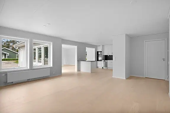 En stor og åpen løsning skaper flere soner i huset, for både ro og festligheter