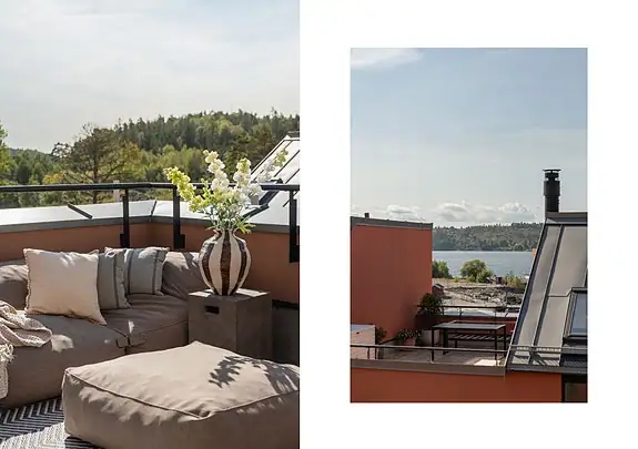 Utsikt mot sjøen, og over trekroner og tak